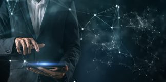 Digital marketing data analytic technology, businessman's hand using mobile phone computer to manage business marketing sale commercial media data cyber space digital world metaverse background