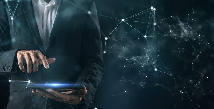 Digital marketing data analytic technology, businessman's hand using mobile phone computer to manage business marketing sale commercial media data cyber space digital world metaverse background