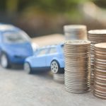 Are You Invalidating Your Car Insurance By Doing These Things? Coins stack and car model on wood table