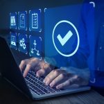 Quality management with QA (assurance), QC (control) and improvement. Standardisation and certification concept. Compliance to regulations and standards. Manager or auditor working on computer.