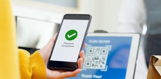 QR code payment, customer using smartphone for paying at shop