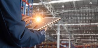 The Evolution of Modern Logistics: How Dynamics 365 Supply Chain Management is Paving the Way Logistic and transport concept Businessman manager using tablet check and control and planning for Modern Trade warehouse logistics.