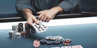 How to Play against All Types of Poker Players Man playing Texas Hold 'em poker at Casino