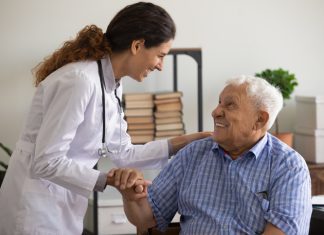 The Importance of Health Insurance for Senior Citizens: A Comprehensive Guide Thankful mature sick man holding nurse hand appreciating for help