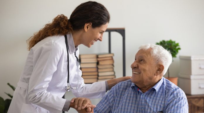 The Importance of Health Insurance for Senior Citizens: A Comprehensive Guide Thankful mature sick man holding nurse hand appreciating for help