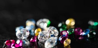 What Is the Best Color for a Diamond? Close up shot of group multi colors diamond on a black background