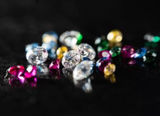 Close up shot of group multi colors diamond on a black background