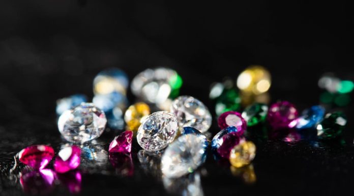 Close up shot of group multi colors diamond on a black background