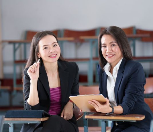 Master's degree female student sitting in the classroom at university