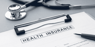 Top 10 Benefits of International Health Insurance Health Insurance form and stethoscope on desk