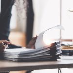 Lawyer business woman working or reading lawbook in office workplace for consultant lawyer concept