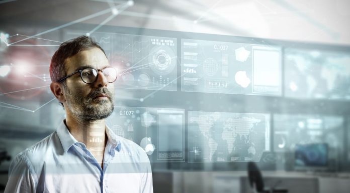 Businessman looking at virtual interface