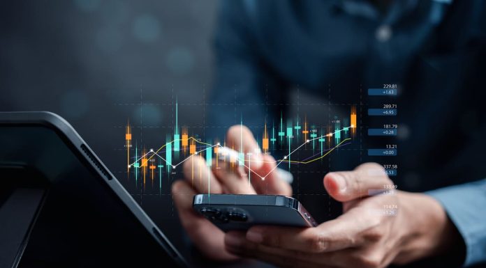 Businessmen investor think before buying stock market investment using smartphone to analyze trading data. investor analysis with stock exchange graph on screen. Financial stock market.