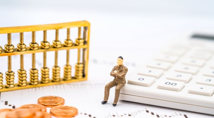 K-line chart, abacus, calculator, and coins