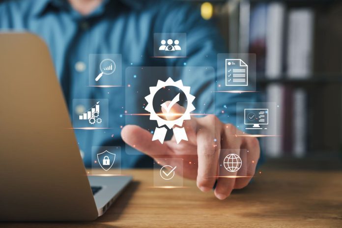 business people touching their fingers Symbol of leading services ISO Certification Document Management System, quality assurance, guarantee. iStock-1462209774