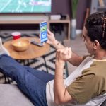 From Stadiums to Smartphones: The Mobile Evolution in Sports and Gaming iStock-1475352394