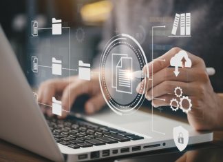 The Future of Document Management: The Role of AI in Document Processing Businessman using a computer to document management concept, online documentation database and digital file storage system or software, records keeping, database technology, file access, doc sharing.