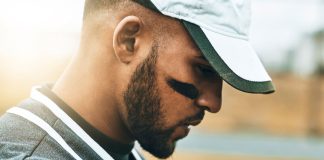 The Trendsetting Appeal of Vetements Hats: A Fashion Icon’s Signature iStock-1446340828