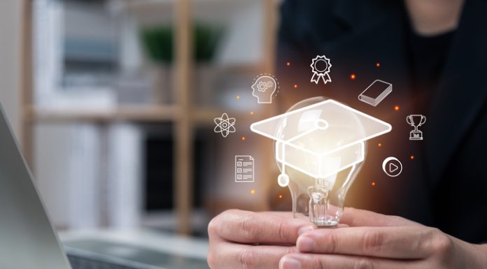 How Specialized AI Courses Can Improve Your Career E-learning graduate certificate program concept, businessman hand holding light bulb with Internet education course degree, study knowledge, creative thinking idea, problem solving solution, AI.