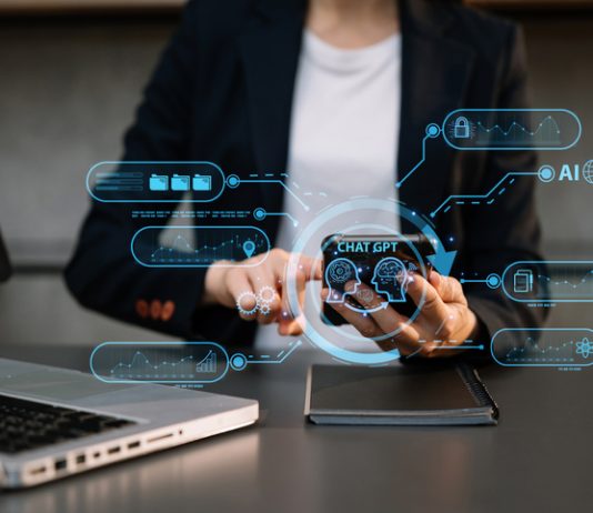 Woman using chatbot in computer and tablet smart intelligence Ai.A.I. Chat with AI Artificial Intelligence, developed by OpenAI generate. Futuristic technology, robot in online system.