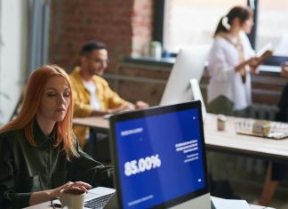 woman seated working on computer