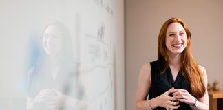 10 Key Benefits of Integrating Recreational Therapy in the Workplace woman work office