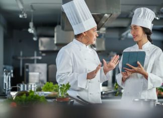 Chefs using tablet