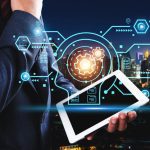 3 Business Outcomes Driving Digital Transformation businessman holding tablet for digital transformation