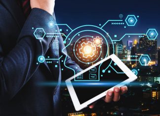 3 Business Outcomes Driving Digital Transformation businessman holding tablet for digital transformation