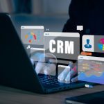 How Much Does It Cost to Develop a Custom CRM Software for Your Business? Businessman working with laptop to CRM Customer Relationship Management Business Internet Techology Concept.