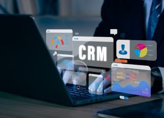 How Much Does It Cost to Develop a Custom CRM Software for Your Business? Businessman working with laptop to CRM Customer Relationship Management Business Internet Techology Concept.