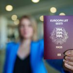 Identity through Time: German Personal IDs as Living Historical Artifacts woman holding passport