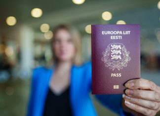 Identity through Time: German Personal IDs as Living Historical Artifacts woman holding passport