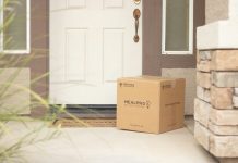 Supercharge Your Business With Same Day Courier Service brown cardboard box beside white wooden door