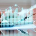How Does Technology Impact the Finance Industry? close-up-hand-typing-calculator (1)
