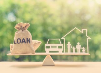 Family financial management, mortgage and payday loan or cash advance concept : Loan bags, family in a house on balance scale, depicts short term borrowing, high interest rate based on credit profile