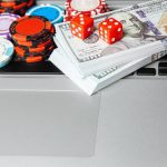 casino ships and money on laptop