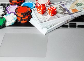 casino ships and money on laptop