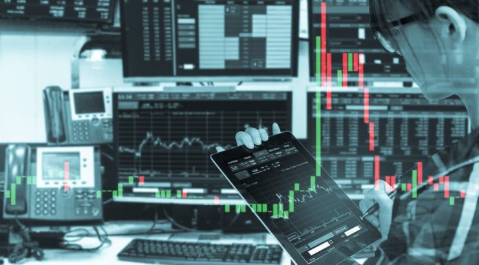The Beginner’s Guide to Understanding Forex Trading Platforms: What You Need to Know Before You Start tablet with stock trading room