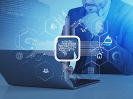 man using laptop with technology integration