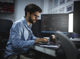 male working using desktop
