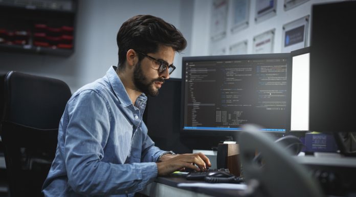 Top Five Benefits of IT Consulting Services male working using desktop