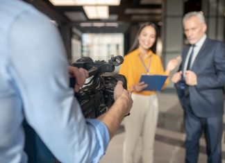 Best Ideas for a Corporate Video Shoot A business man having an interview with a girl