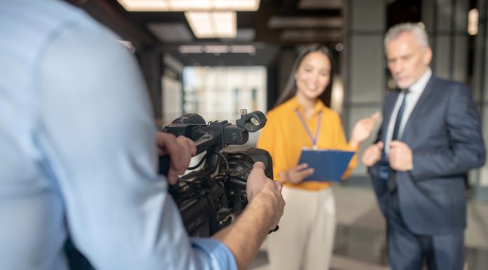 A business man having an interview with a girl