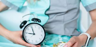 How Much Does Inspire Sleep Therapy Cost? A Comprehensive Pricing Guide Therapist holding a alarm clock and vitamins