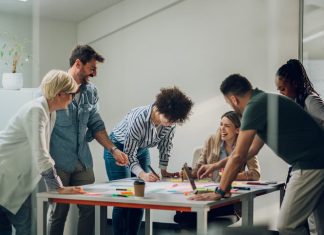 A Three-legged Stool Approach to Balance Purpose, Culture and Strategy Business team on a meeting