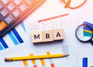 How can Pursuing an MBA in Business Analytics Impact Your Career? MBA letters on wooden block