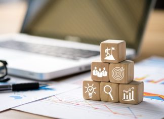 6 Employee Performance Goals to Set Your Team Up for Success (+ Examples)Â KPI, Business goals and performance on wooden block
