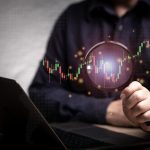 magnifying glass and investment