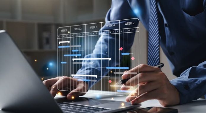 businessman planning software on laptop